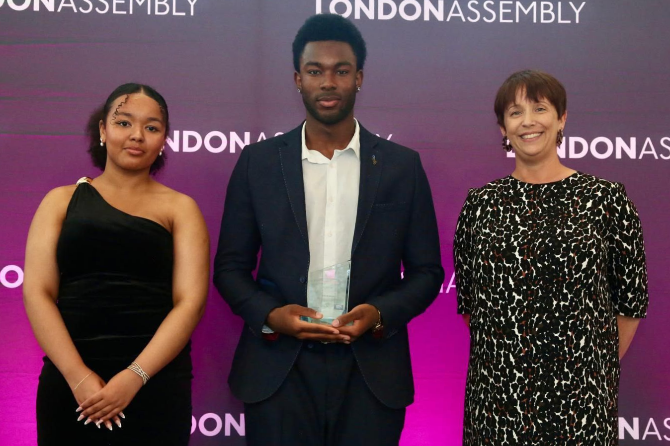 Lenon Muma receiving the Young Leader Award at the London Youth Achievement Awards