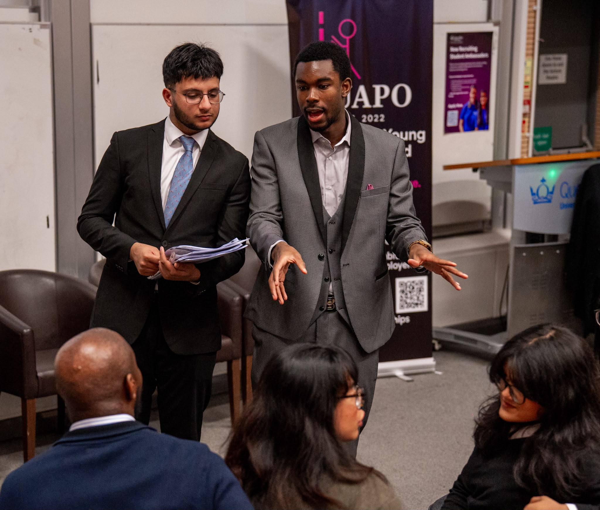 Lenon Muma speaking at QAPO event